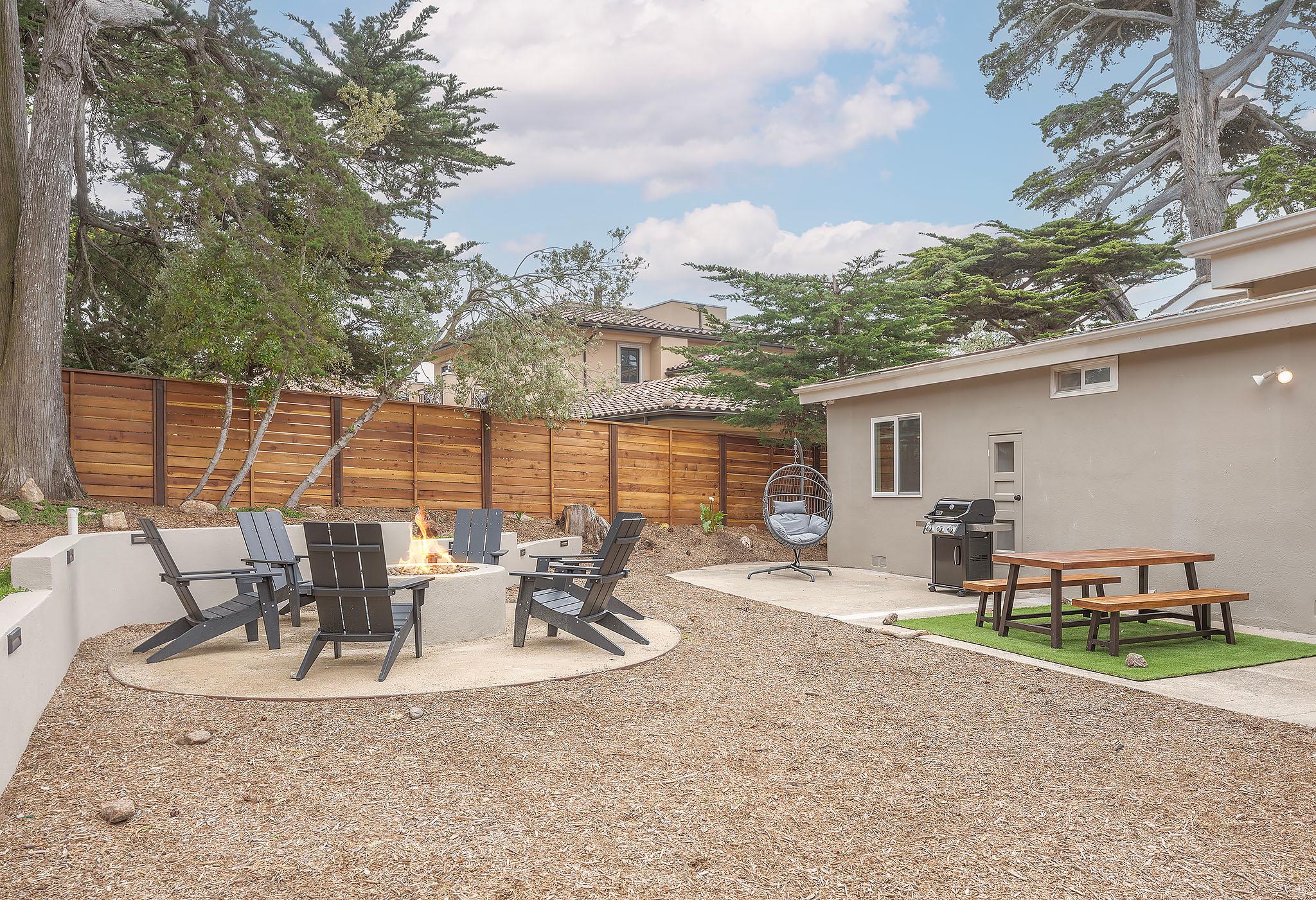 Fenced Back Yard with Seating, Fire Pit and Gas BBQ