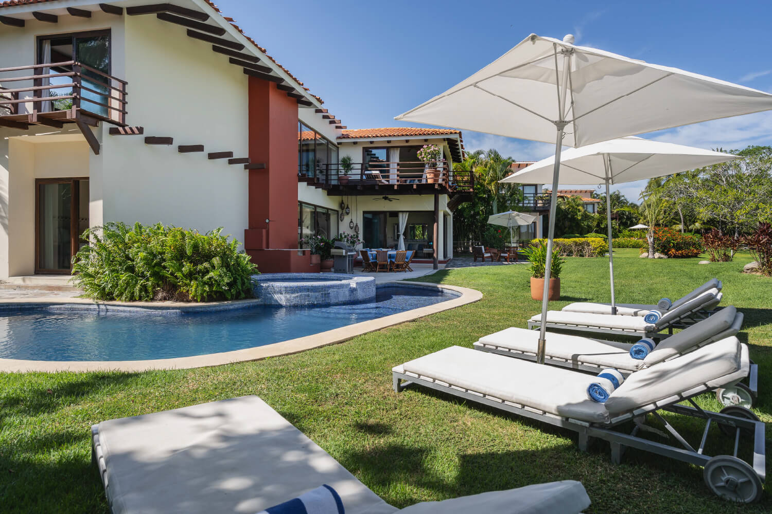 This luxurious villa has a private pool and hot tub.