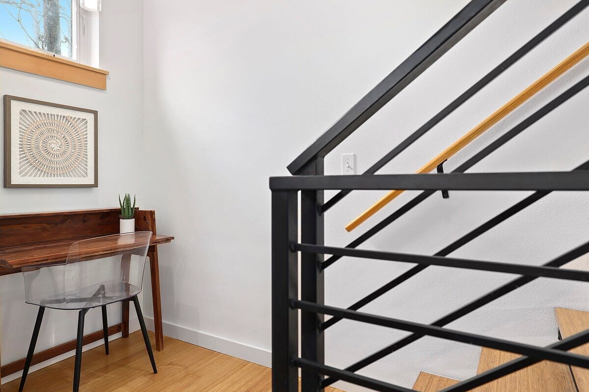 Upon entering our home, you'll be greeted by our staircase, which leads to the second and third floors.
