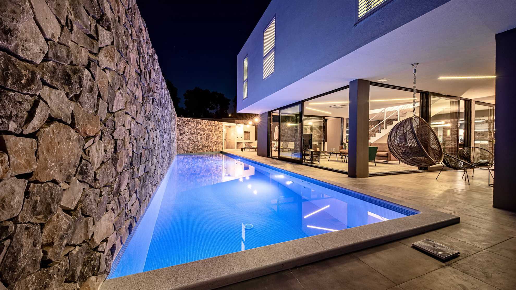 Property Image 2 - Contemporary Glass Villa with Private Pool and Parking