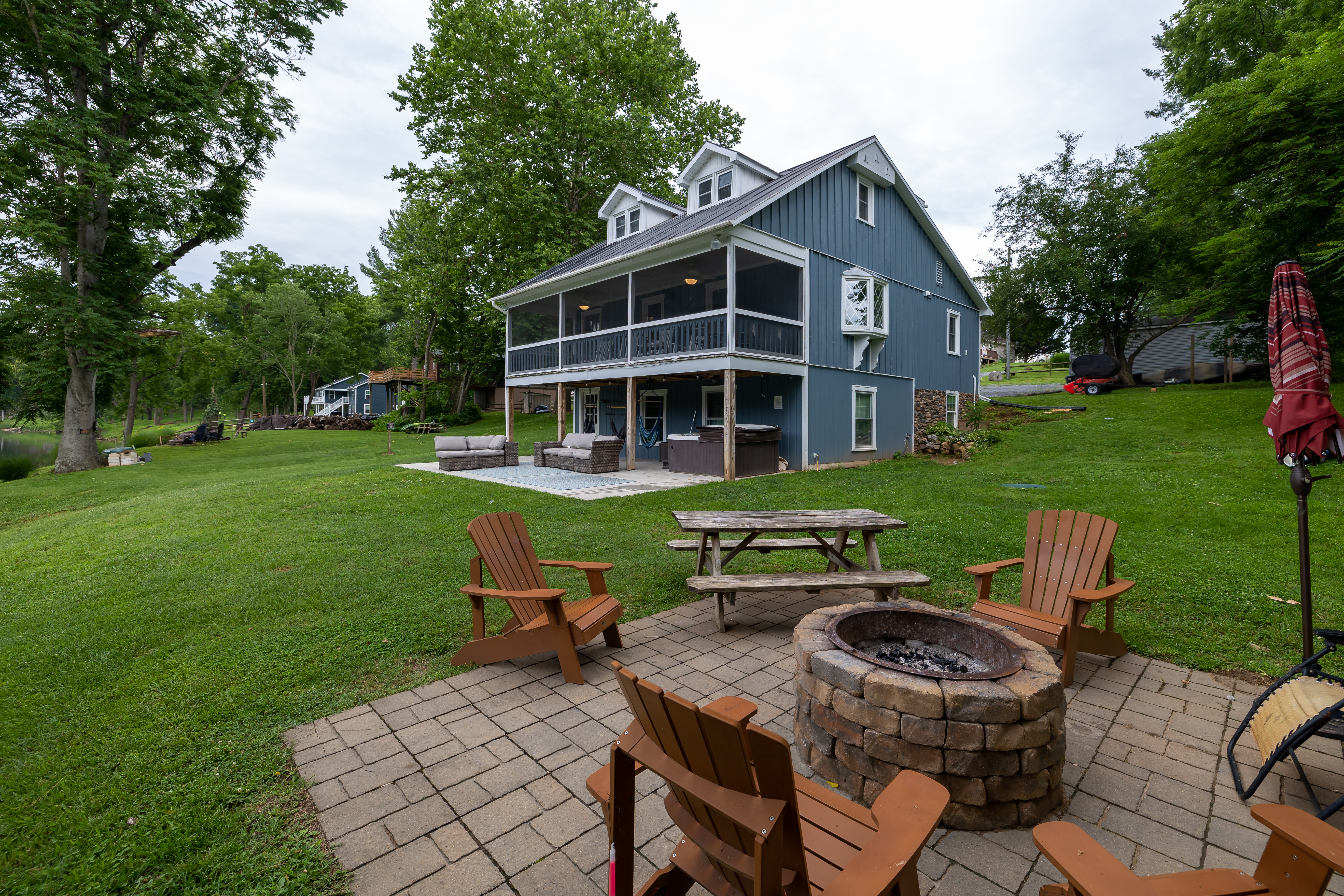 Property Image 1 - *Updated Riverfront home*Steps to the Shenandoah River*Sandy beach by River*Fire Pit*Hot Tub*Fishing*Kayak