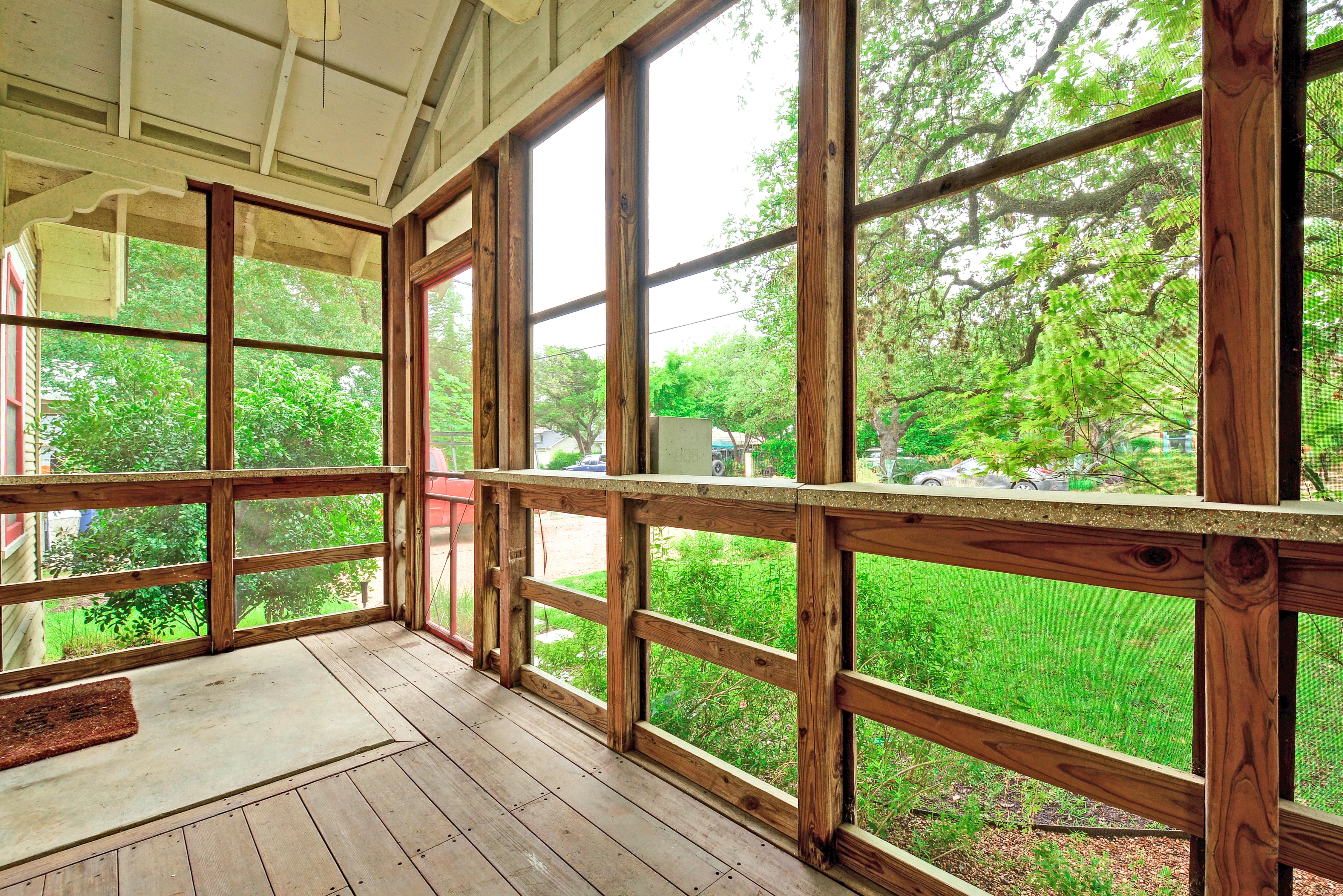 The screened front porch is a relaxing spot to enjoy morning coffee.