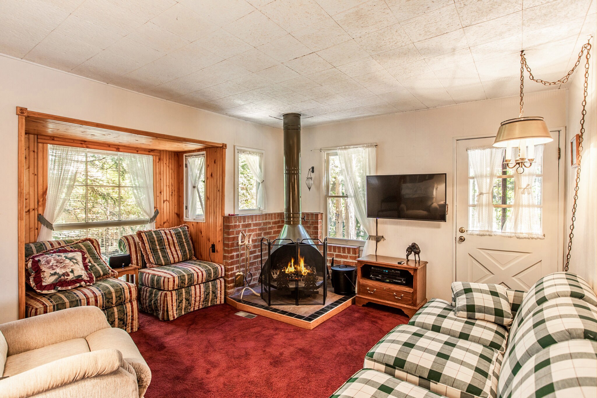 Lounge around the wood-burning fireplace.