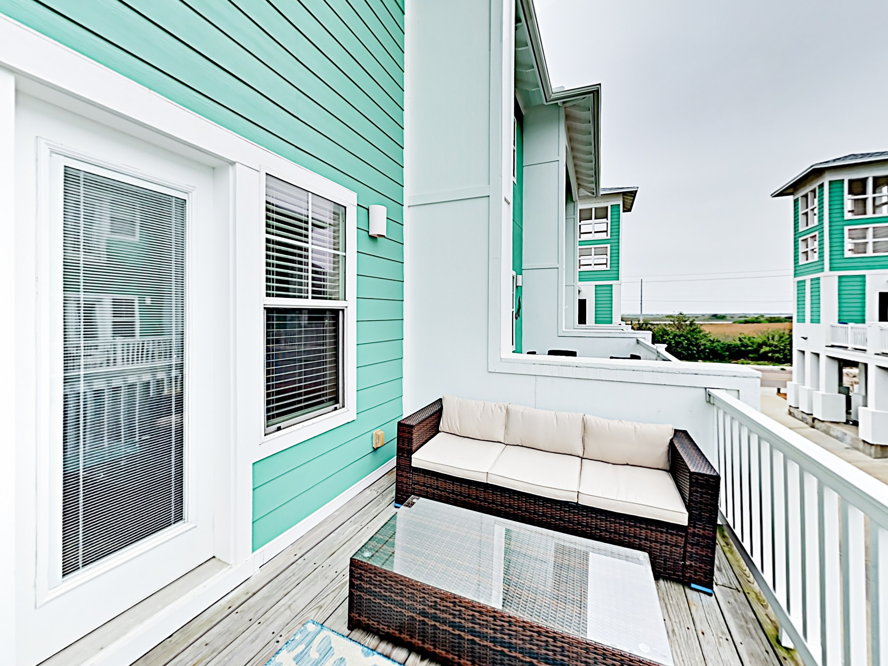 Find seating for 5 on the 2nd-story deck.