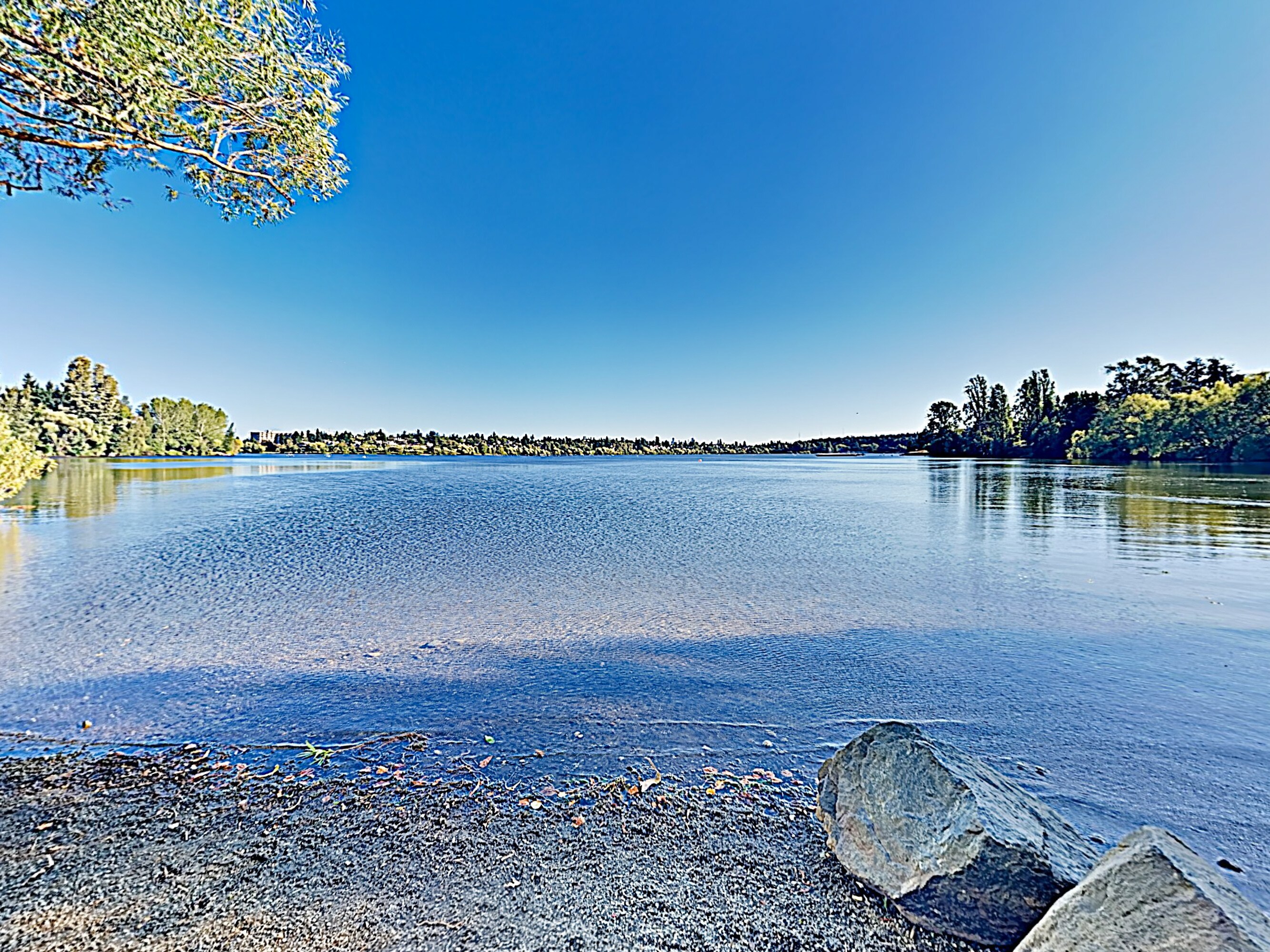 Shimmering Green Lake is a short walk from your door.