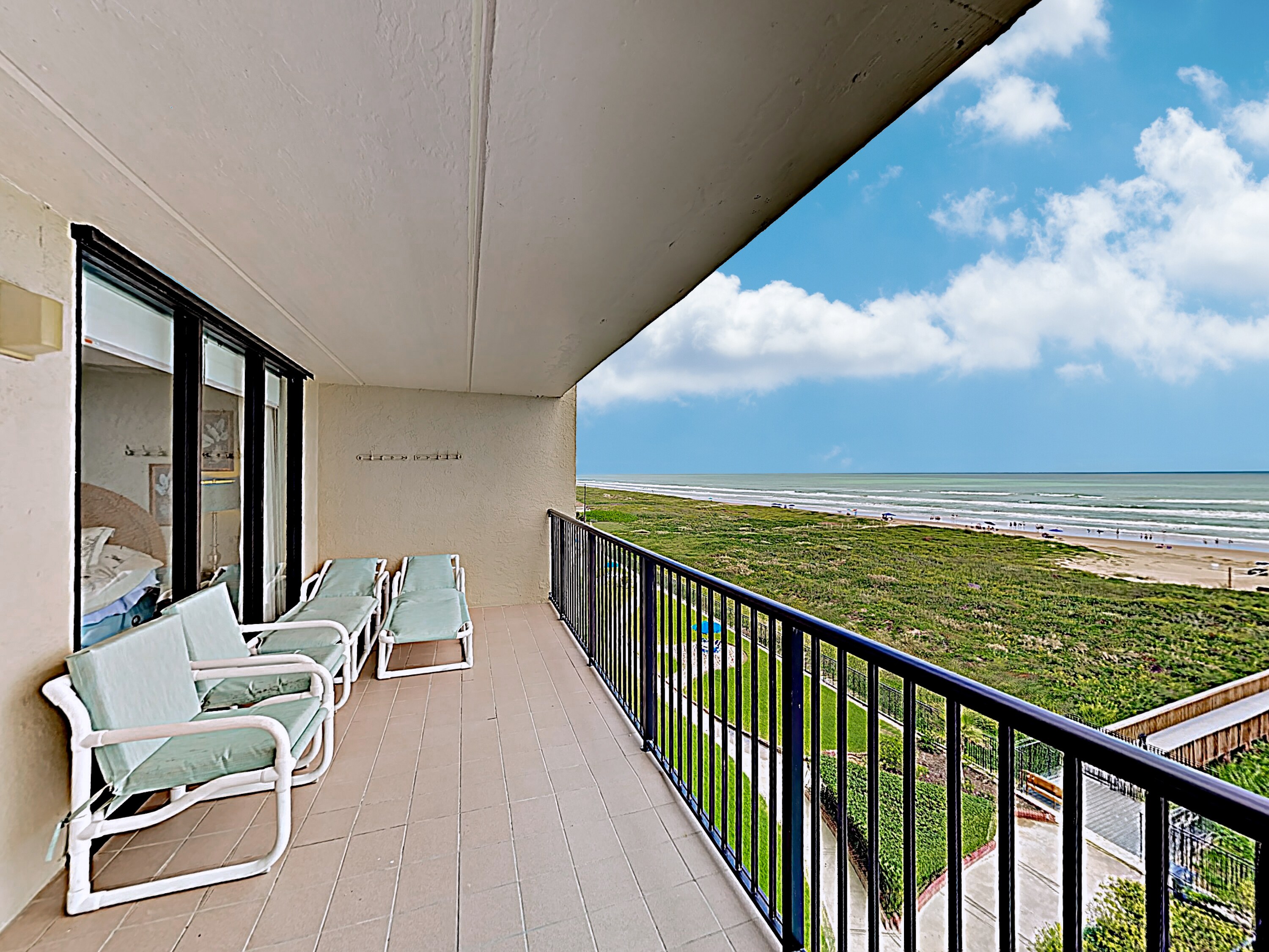 Relish in the coastal air from the privacy of the covered balcony.