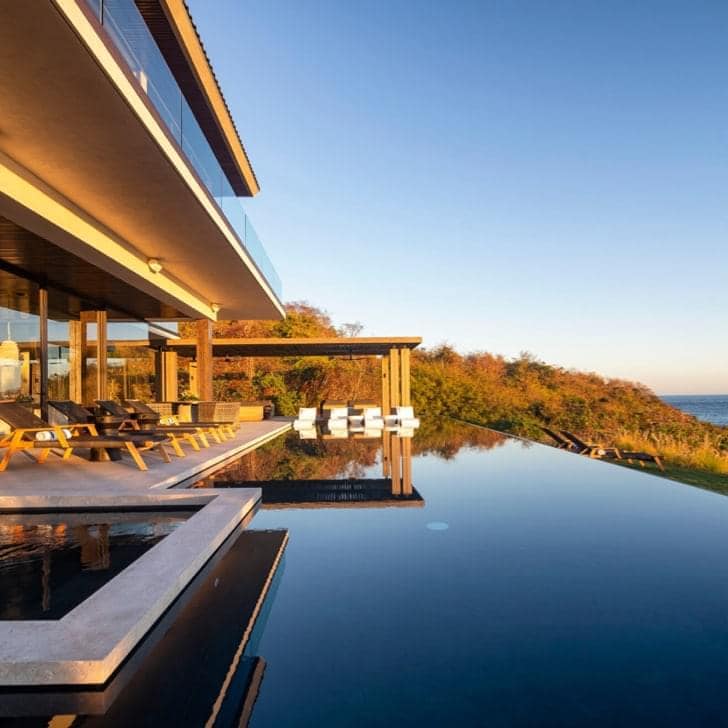 Punta Mita home exterior featuring infinity pool