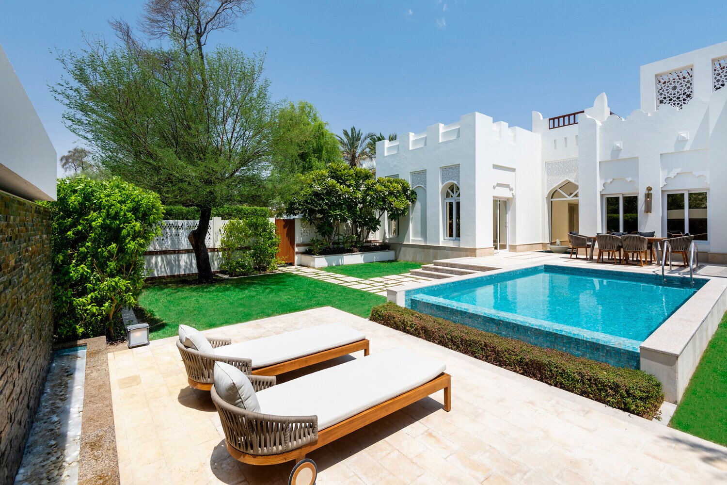 Enthralling two bedroom villa with arabesque design, plunge pool and lush garden