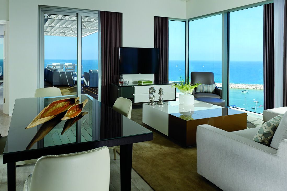 Enjoy breathtaking views and ample space at the One Bedroom Penthouse Suite.