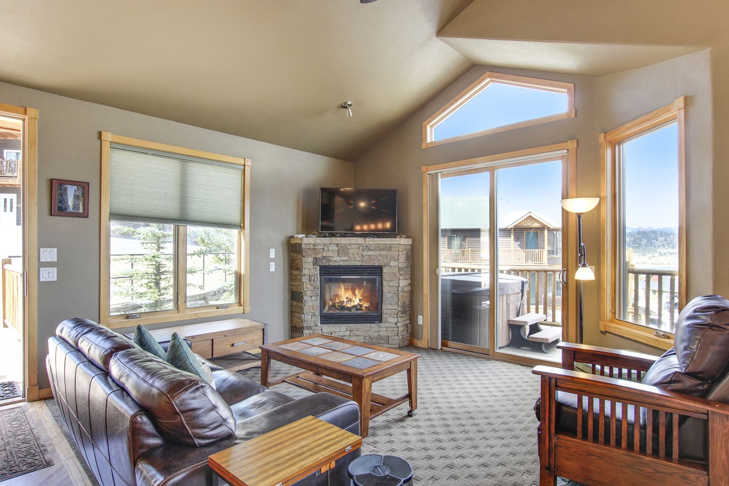 Chief Cheley Peak 40A - Cozy up to the fireplace after enjoying a soak in your private hot tub.
