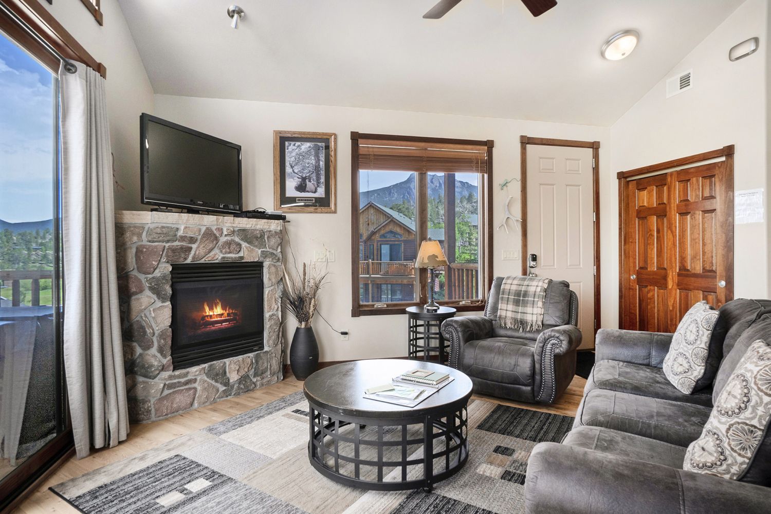 Gas Fireplace  - Enter into your gorgeous living room which includes sofa for 3, comfy side chair, gas fireplace and flat screen TV.