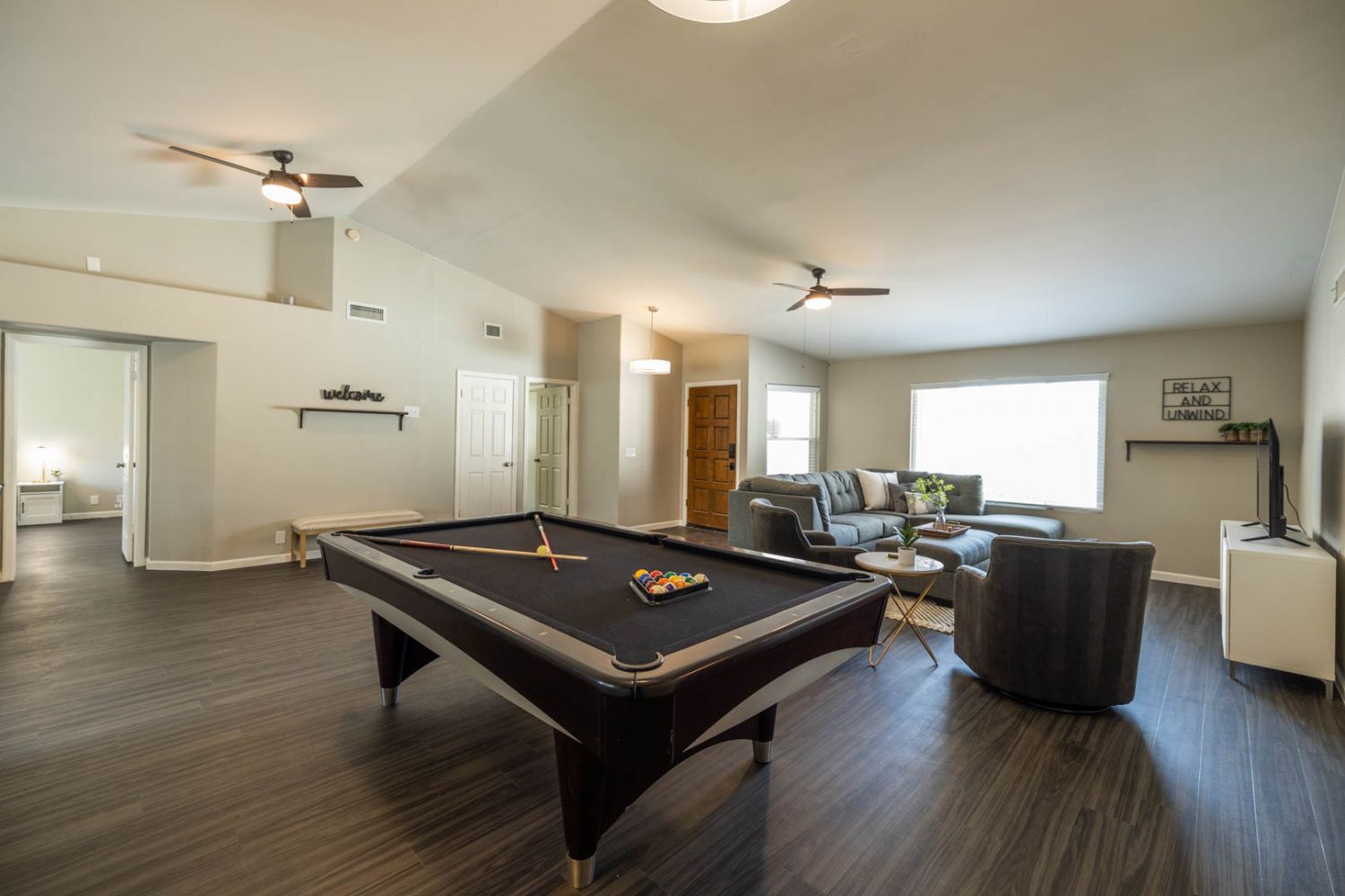 Open concept living room/pool table room area - 