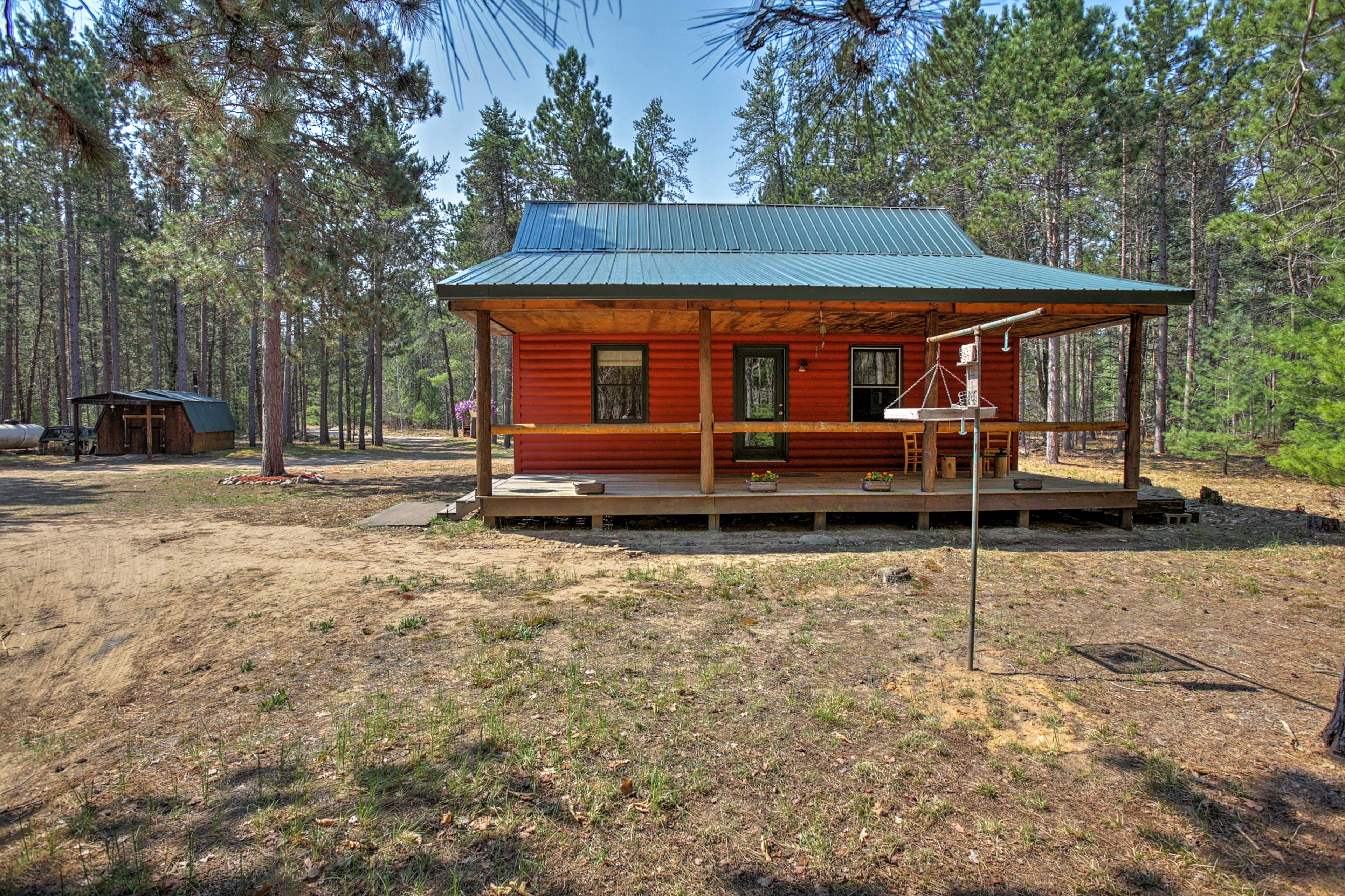 Property Image 1 - Private South Boardman Cabin on 10 Forest Acres!