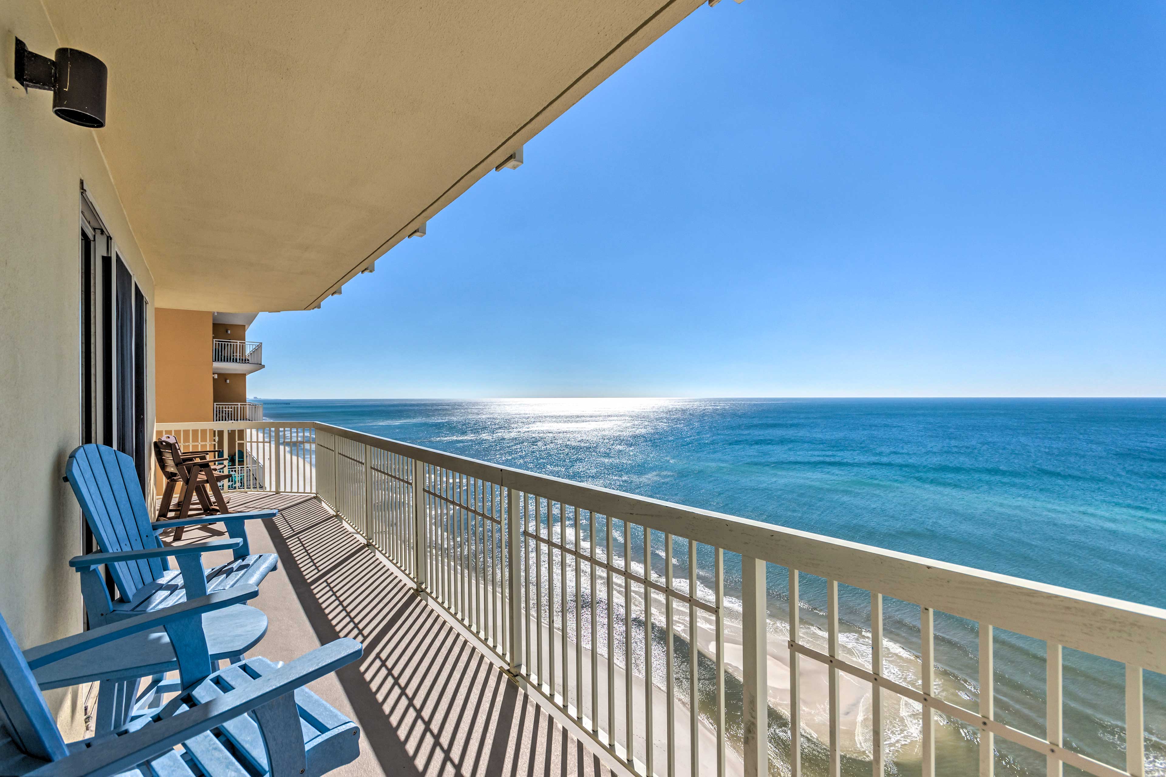 Property Image 1 - Bright Beachfront PCB Unit: Balcony & Beach Chairs