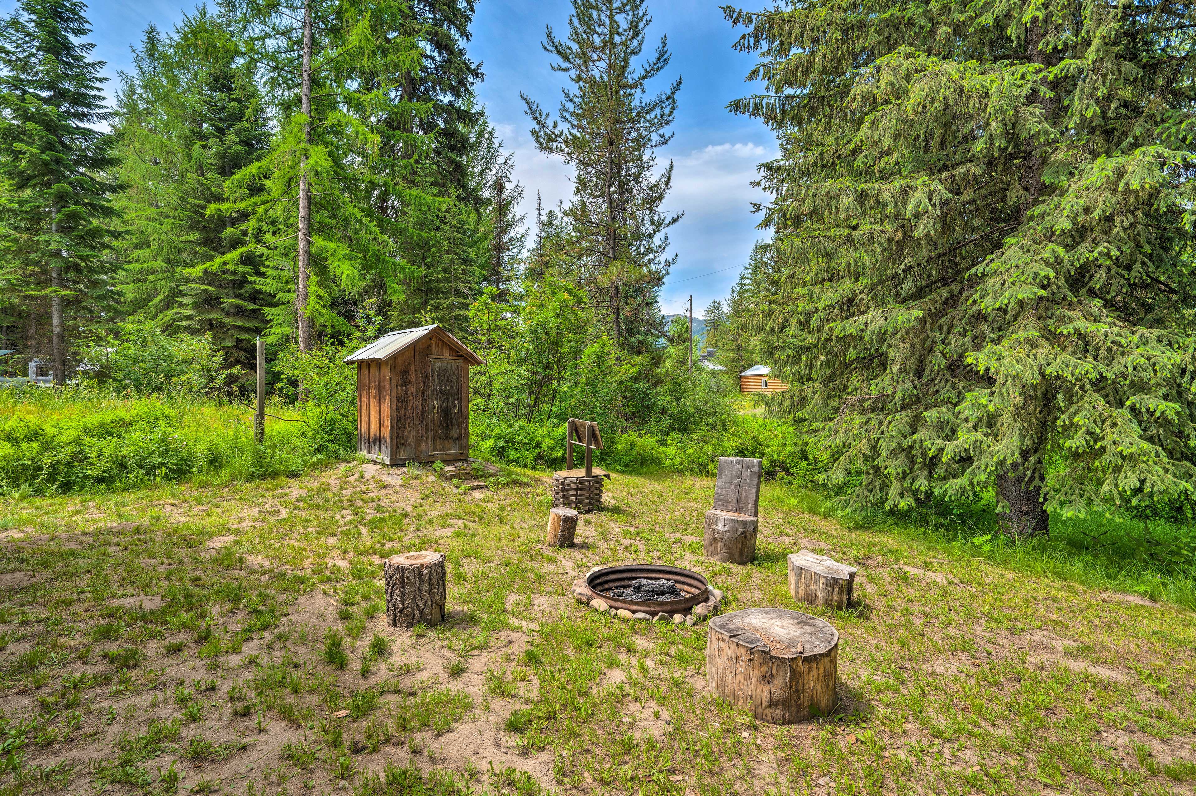 Property Image 2 - Cute Donnelly Cabin in the Woods w/ Fire Pit!