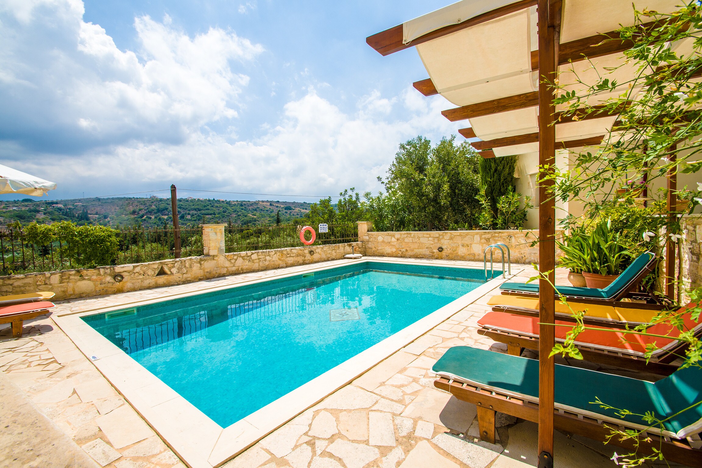 Helianthos villas, large pool with views to the countryside