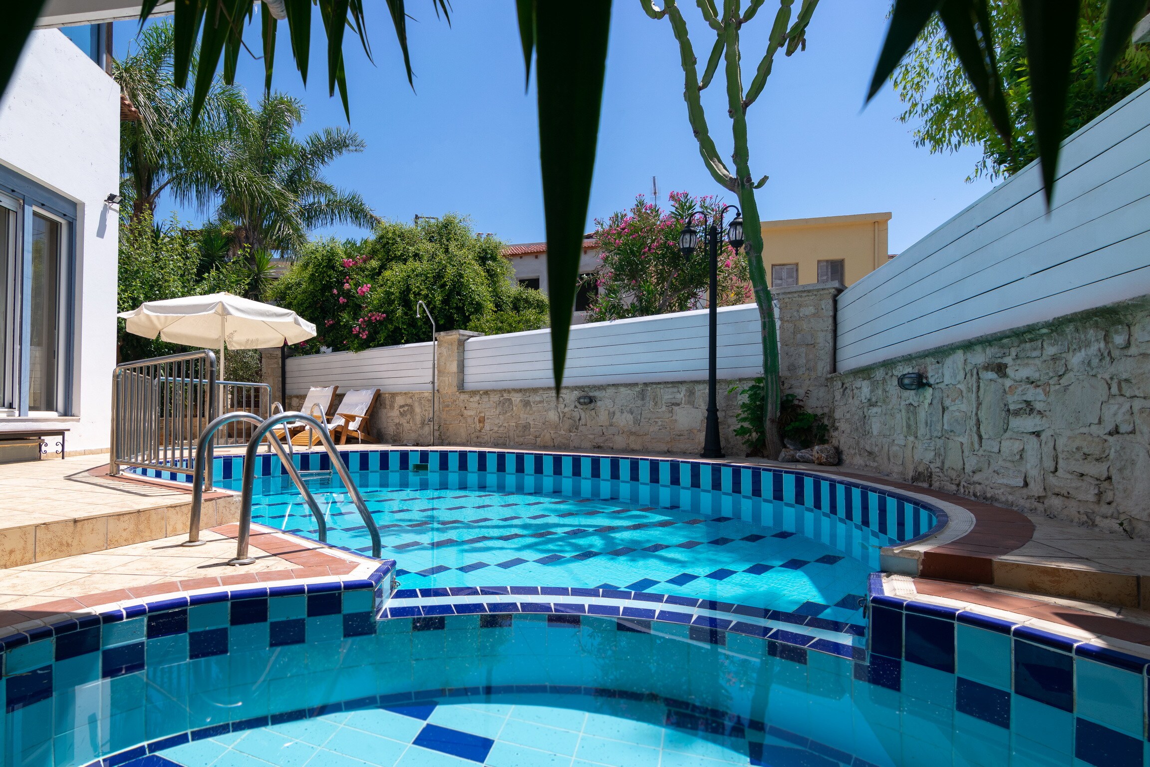 Swimming pool area of Large beautiful villa with fantastic views in Loutra, Rethymno