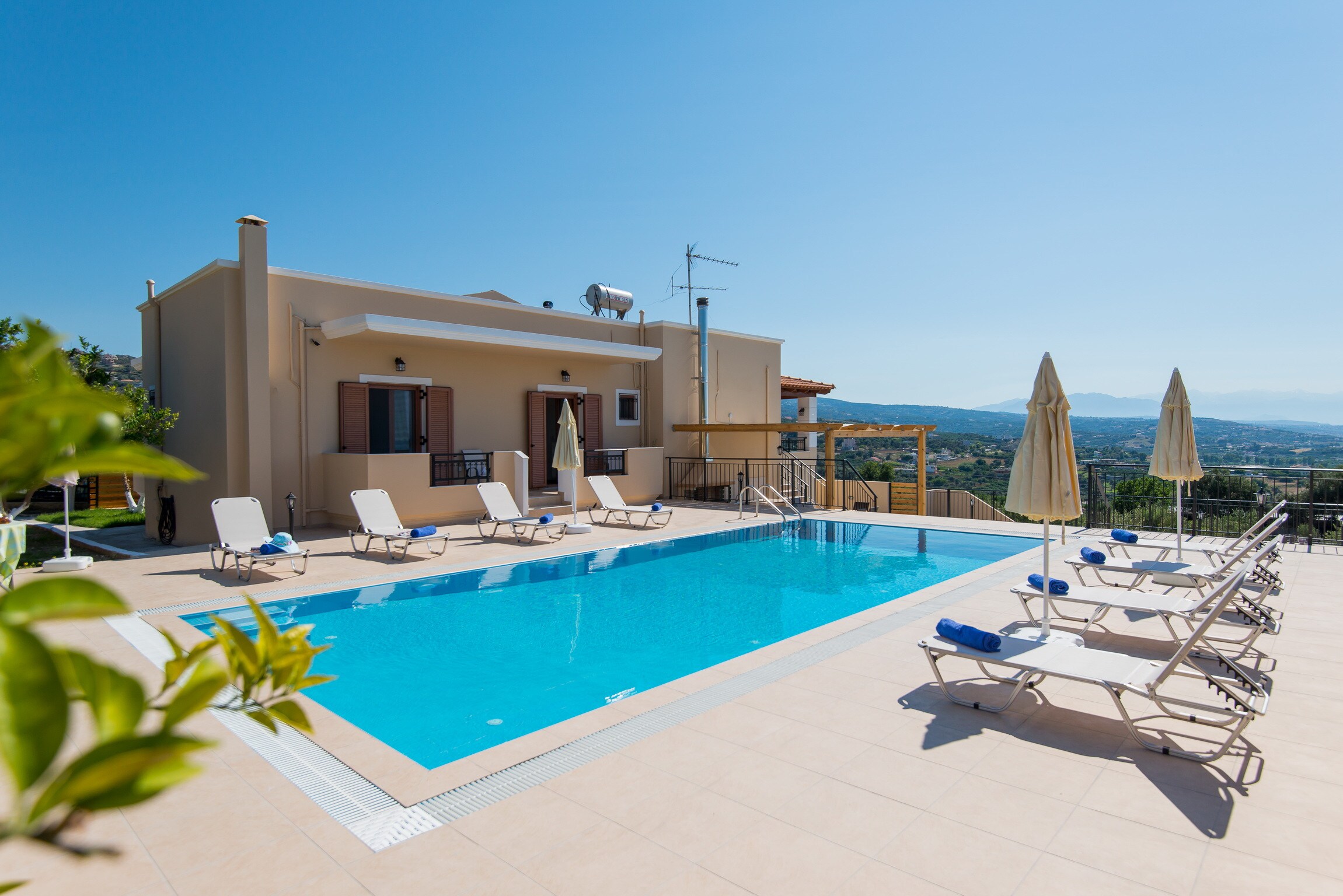 Swimming pool area of large modern villa with private pool near Platanes, Rethymno, Crete