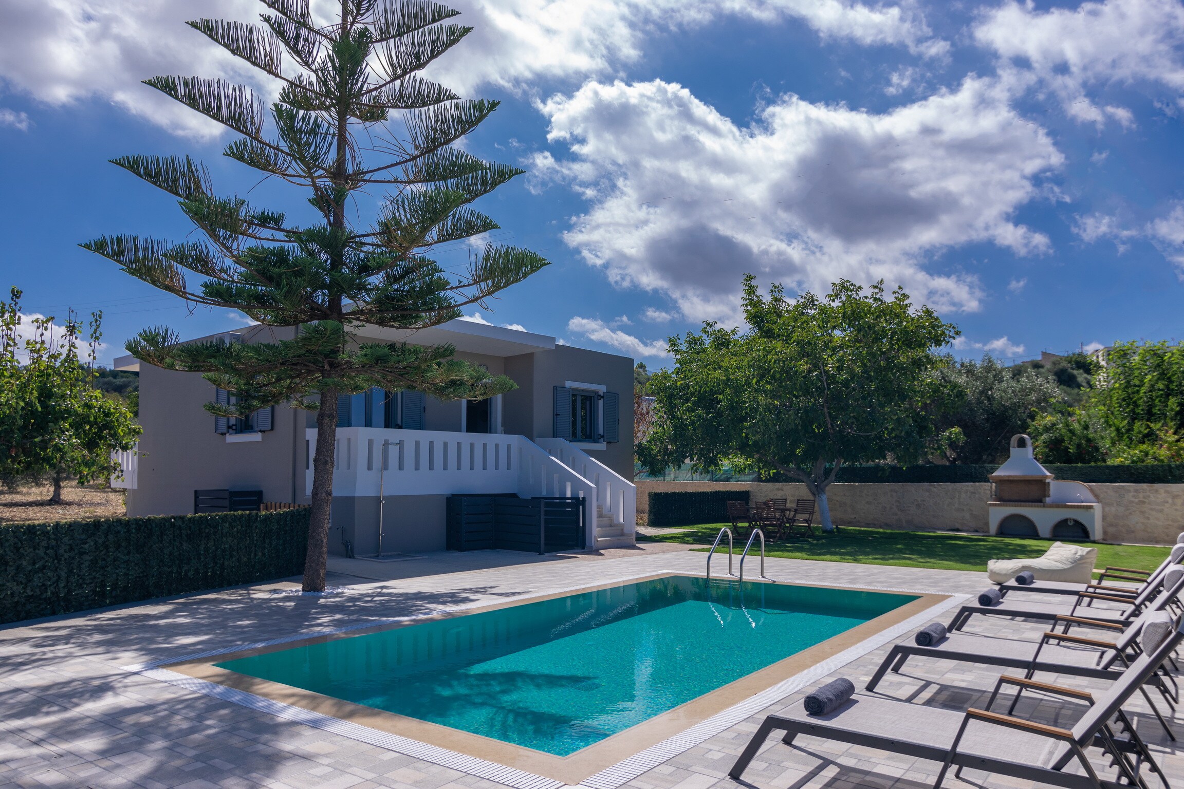 Main facade and swimming pool of Modern rural villa,Private pool,For Families,Ideal location,Rethymno,Crete