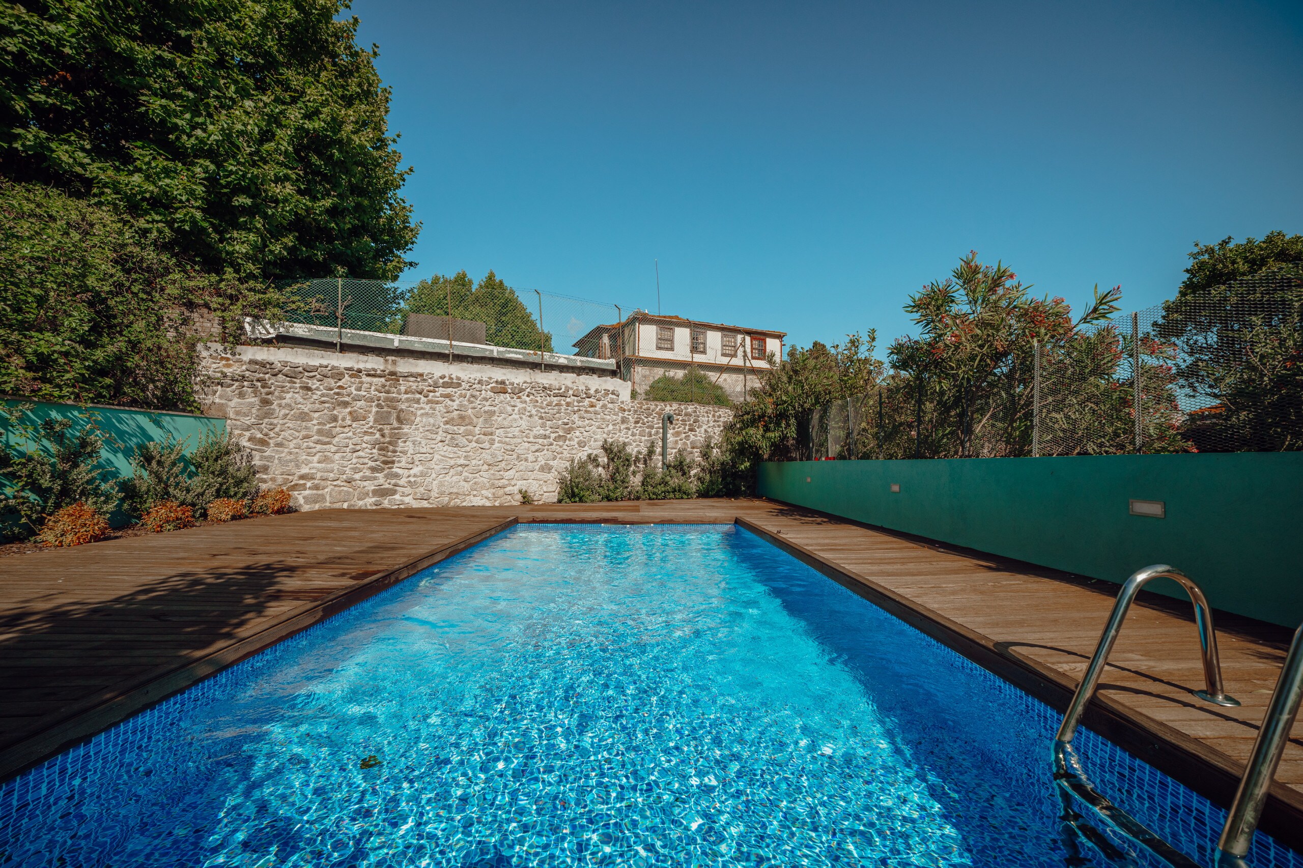 Property Image 1 - Sophisticated Stone Apartment Overlooking the Pool