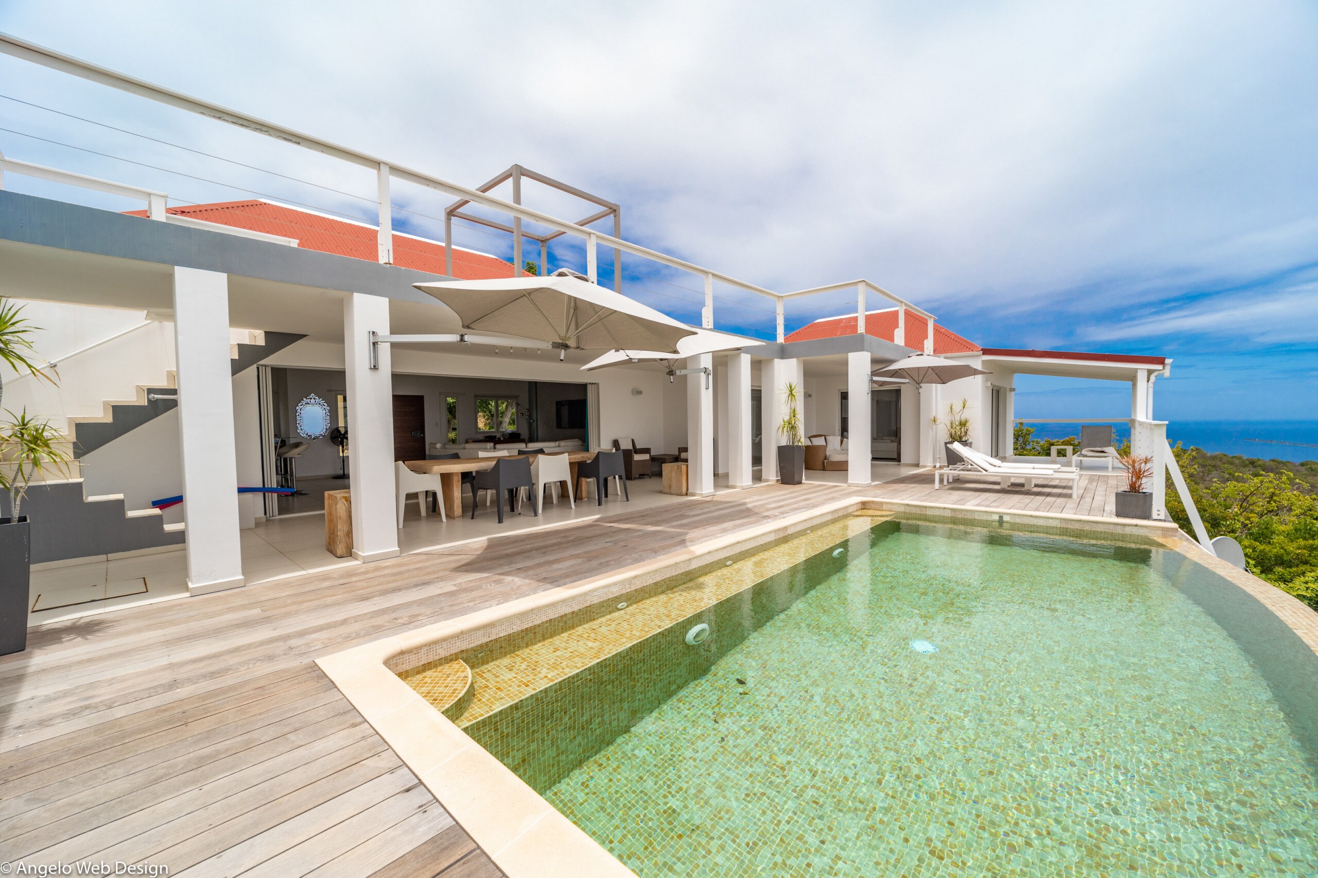 Heated pool, deck chairs, large terrace surrounding the pool.&nbsp;