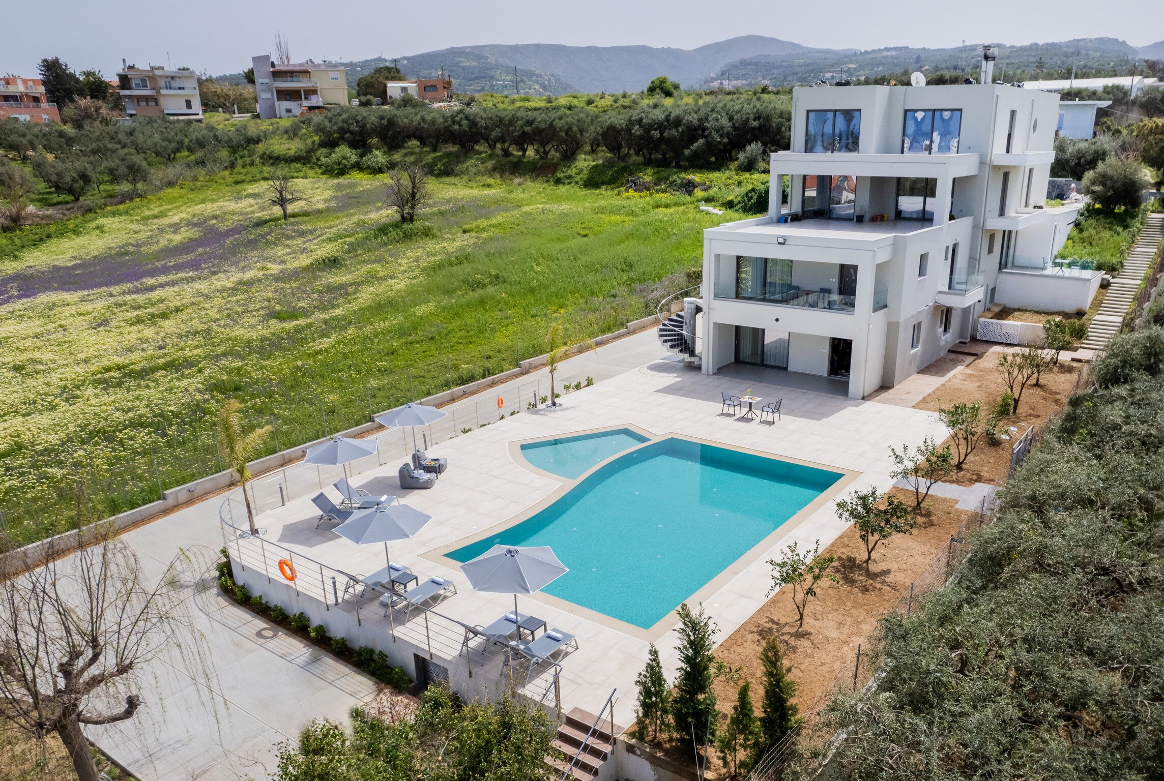 Exterior view & private Swimming pool of Modern 3 apts Villa,Huge Swimming pool,Near all amenities,Rethymno,Crete,Greece