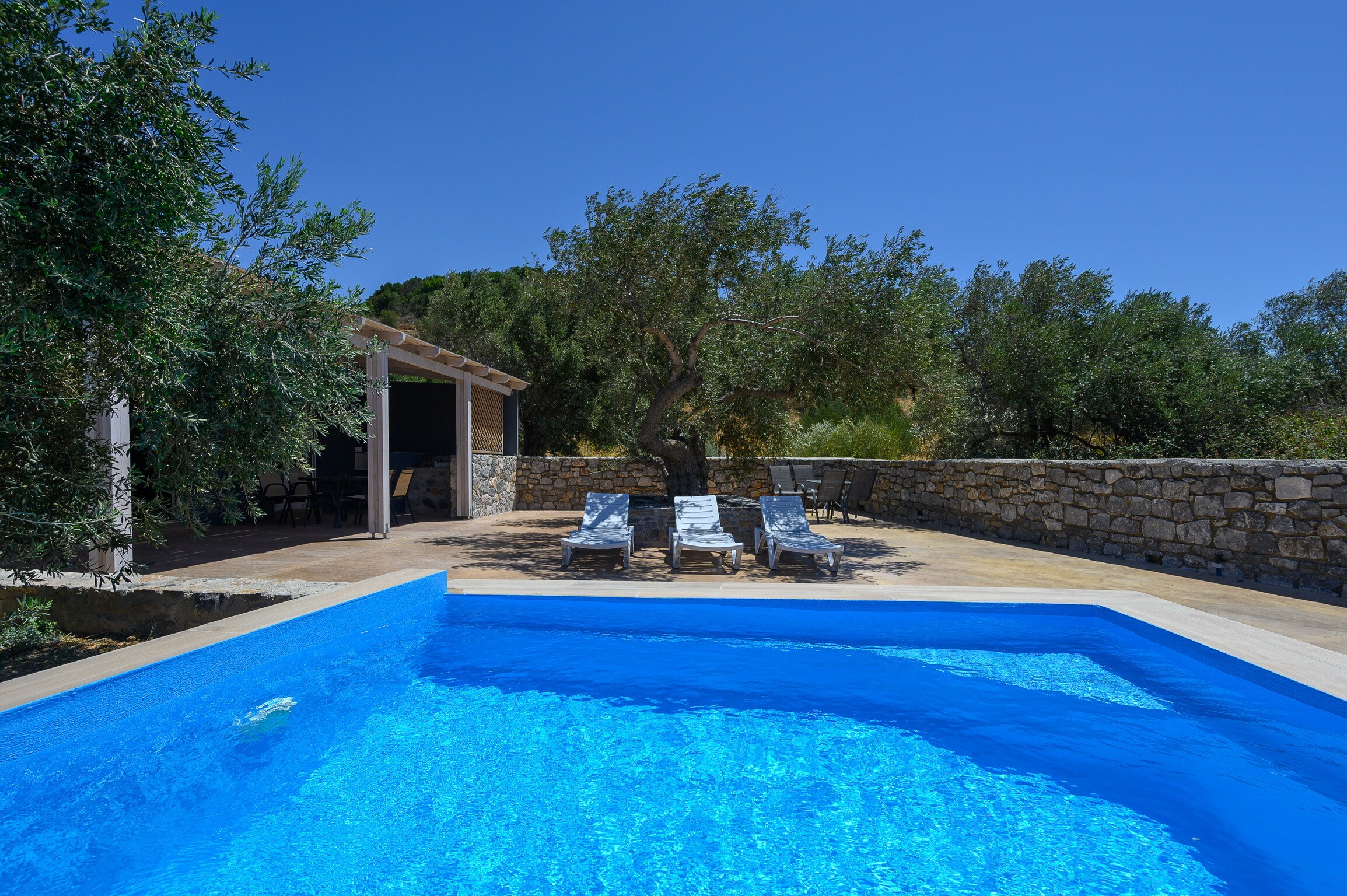 Swimming pool area of Cozy villa,Private pool,Near taverns,South coast,Lefkogia,Crete,Greece