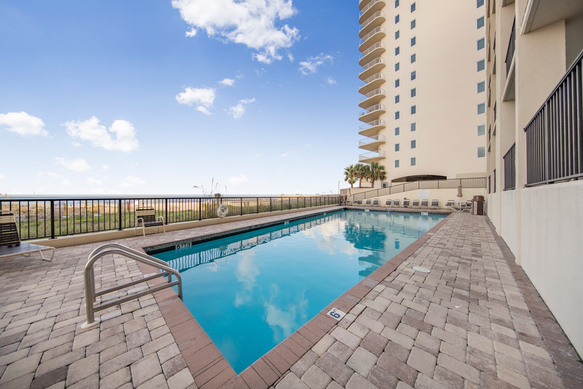 Property Image 2 - Beachfront condo with wraparound balcony & pools