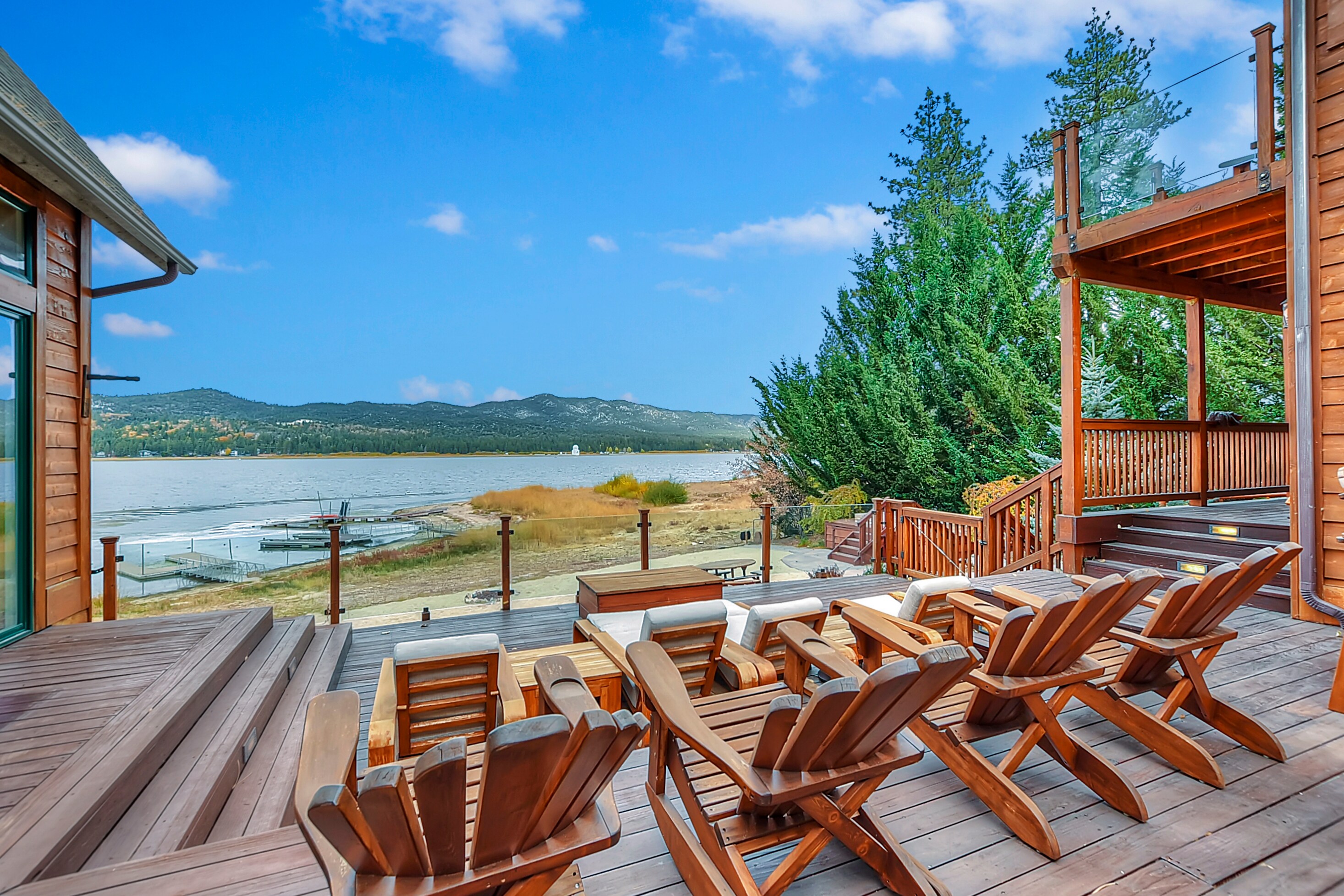 Spacious deck with plenty of seating to enjoy views of the lake.