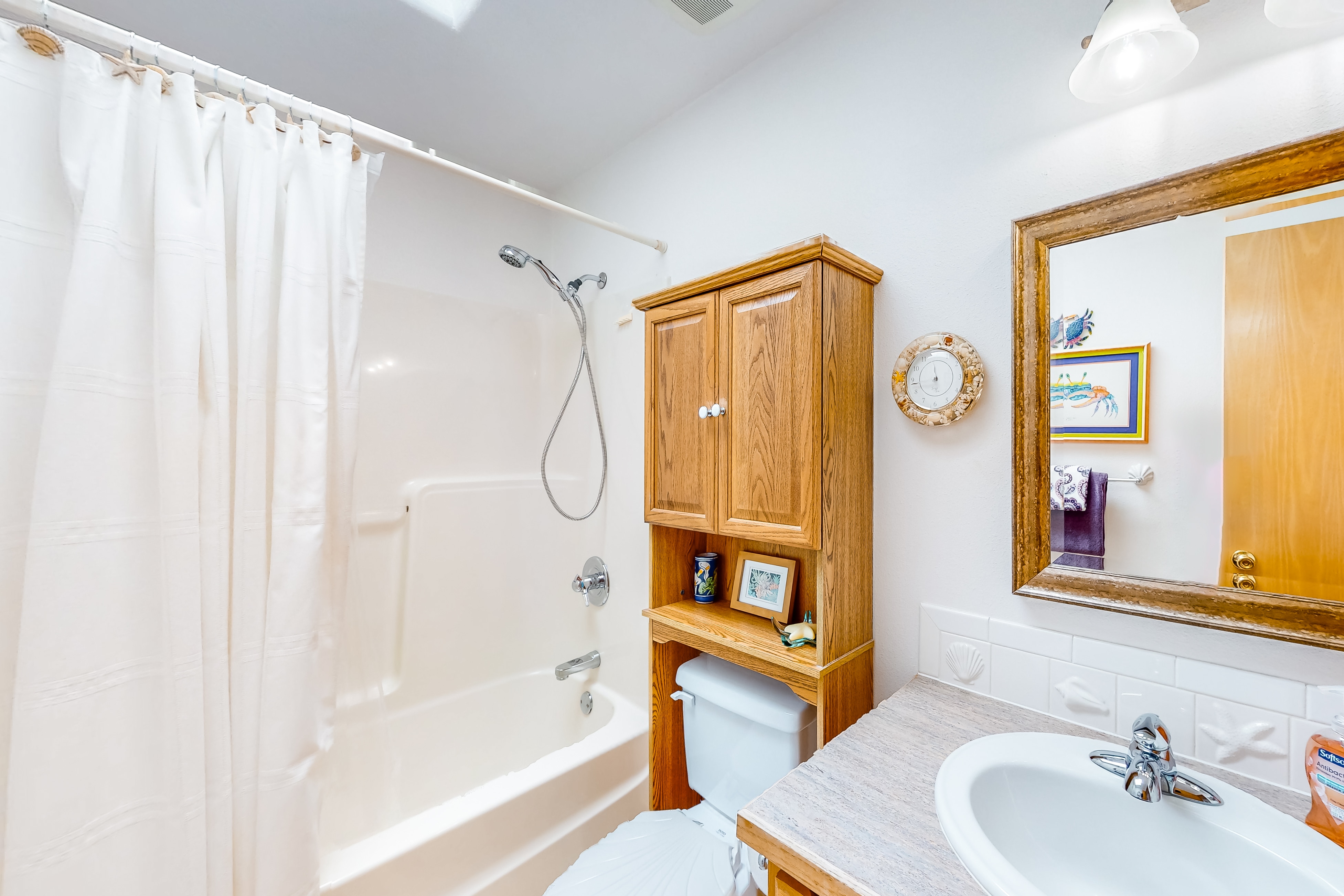 Comfy beach home with ocean views, free WiFi, private washer/dryer, and deck