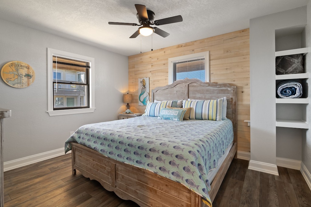 Get even more rest in the gorgeous bedroom with wooden paneling!