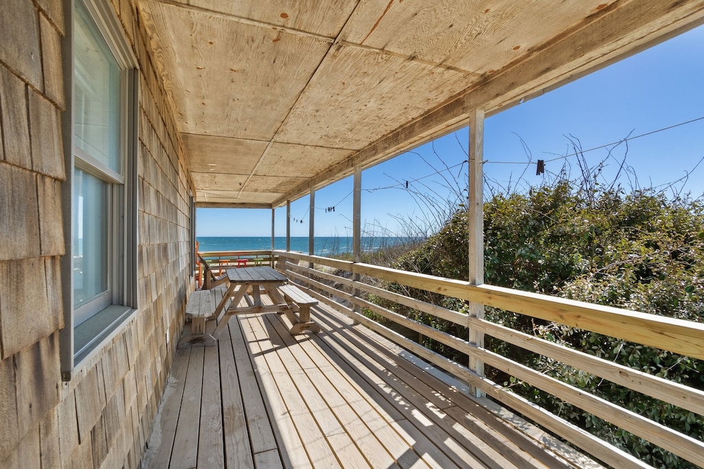 Enjoy cool drinks overlooking the ocean from the wrap-around deck!