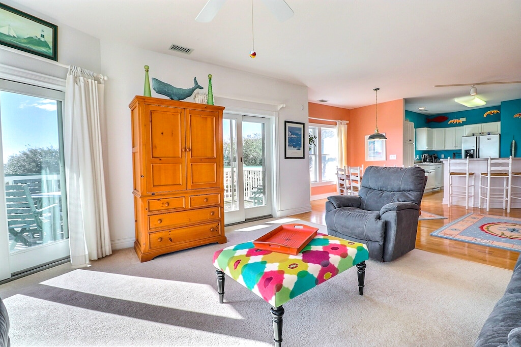 Living room facing the kitchen.