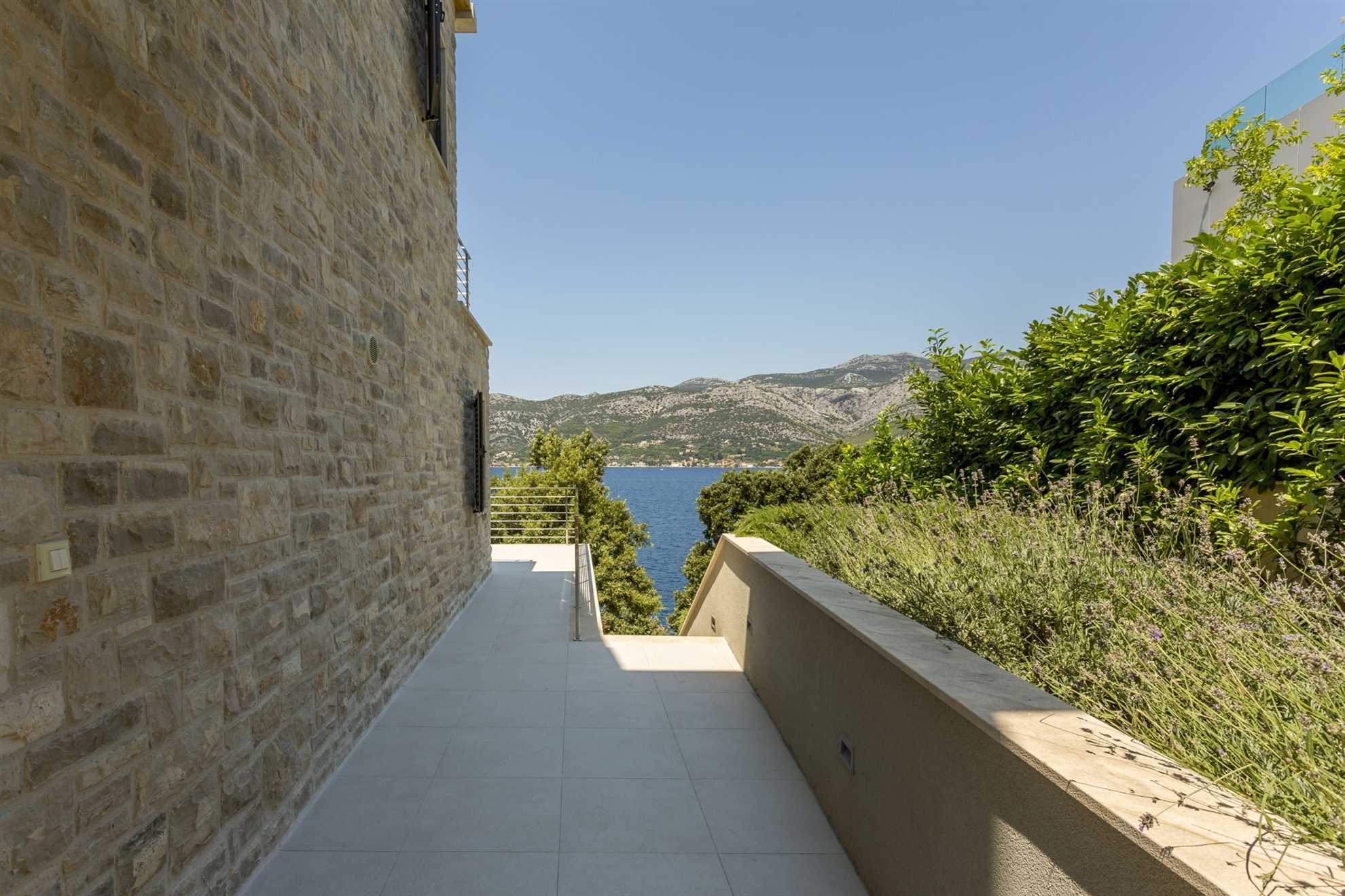 Stunning Beachfront Villa with Heated Infinity Pool