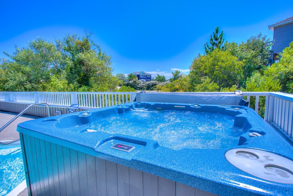 Rest up in the Warm, Bubbly Hot Tub after a day at the beach!