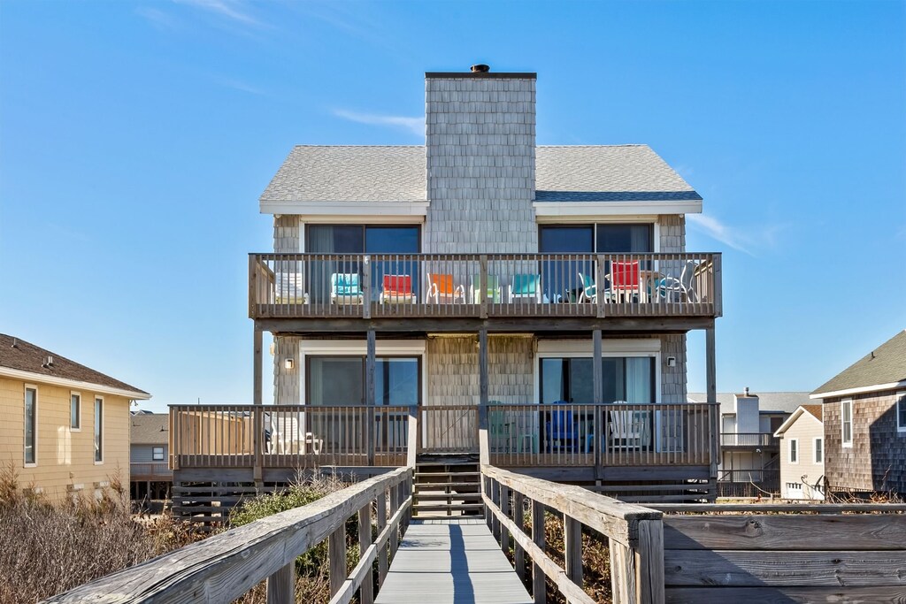 Back exterior of this classic beach front home