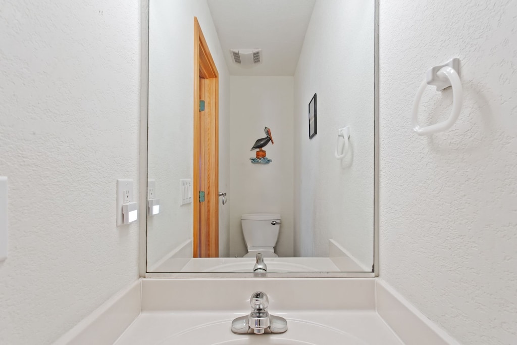 The Half Bathroom offers extra convenience.