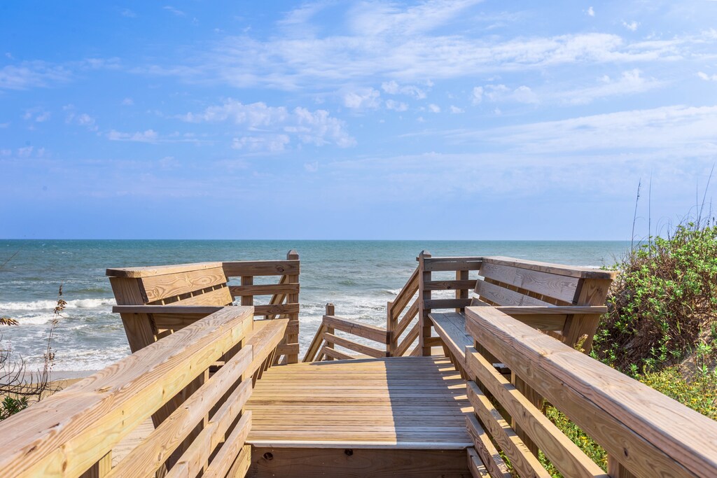 If you dream of spending all day by the ocean, you'll love being able to come and go as you please via the private beach boardwalk with dune-top seating.