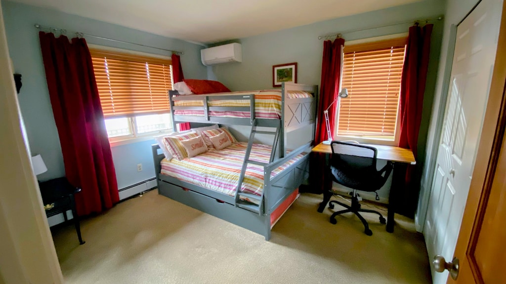 Bedroom with Twin-over-Full Bunk Bed and workspace