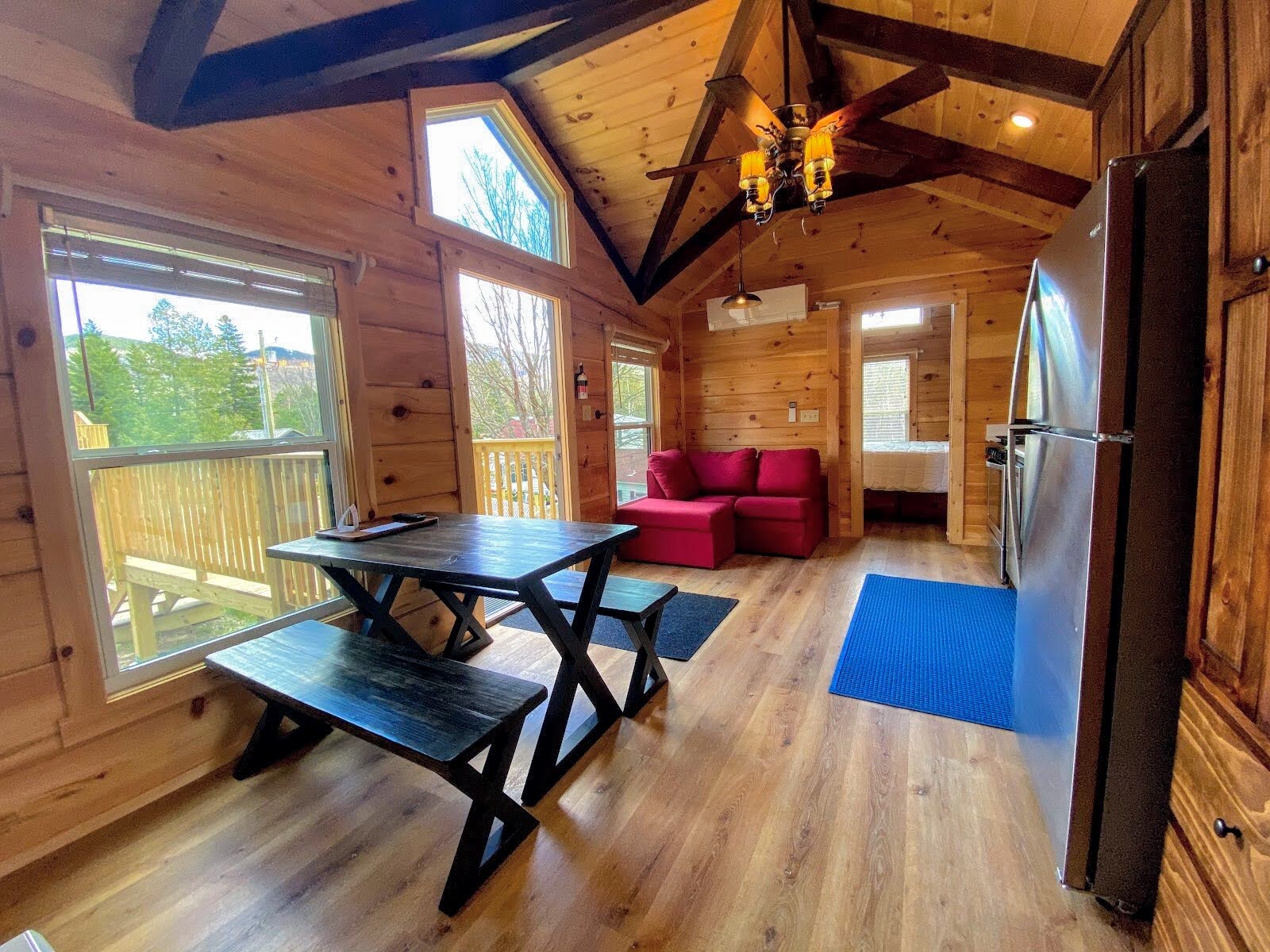 Our tiny homes were manufactured to ensure a limited environmental impact using logs from US Forest Service Certified Sustainable Forests, radiant insulation, gas fireplaces and high efficiency mini split heating and air conditioning.