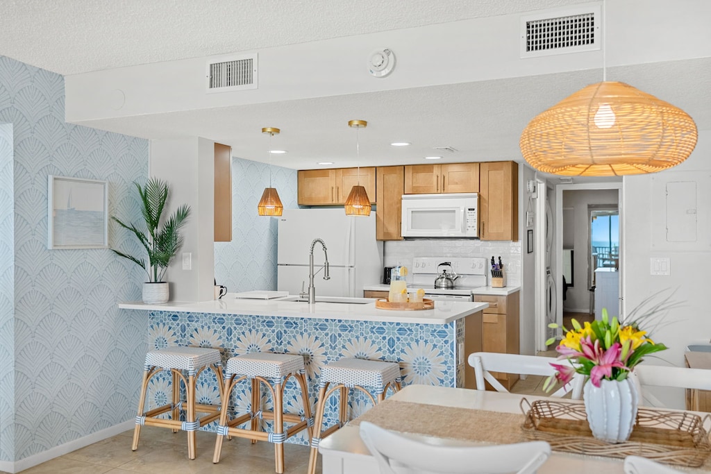 Beautiful breakfast bar seats three