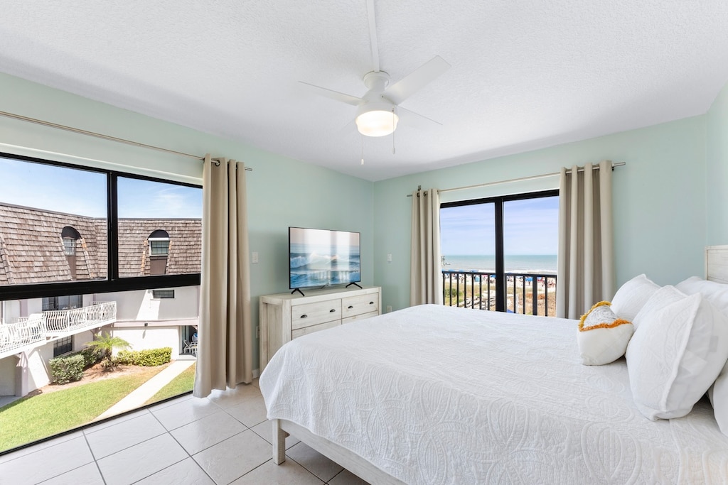 Master bedroom with king size bed, direct ocean views and a big screen TV
