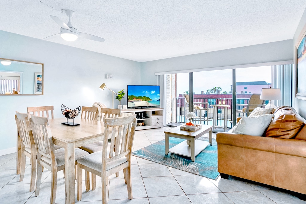 Open dining and living space with bright decor and a welcoming atmosphere