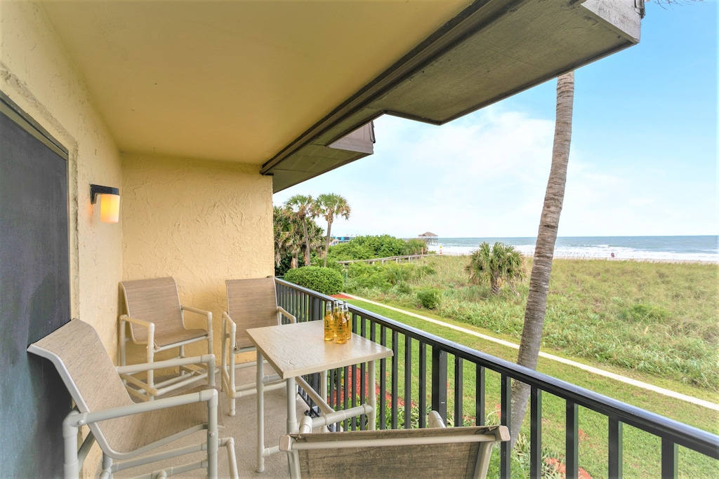 Relax on the balcony with a peaceful ocean breeze and scenic pier views.