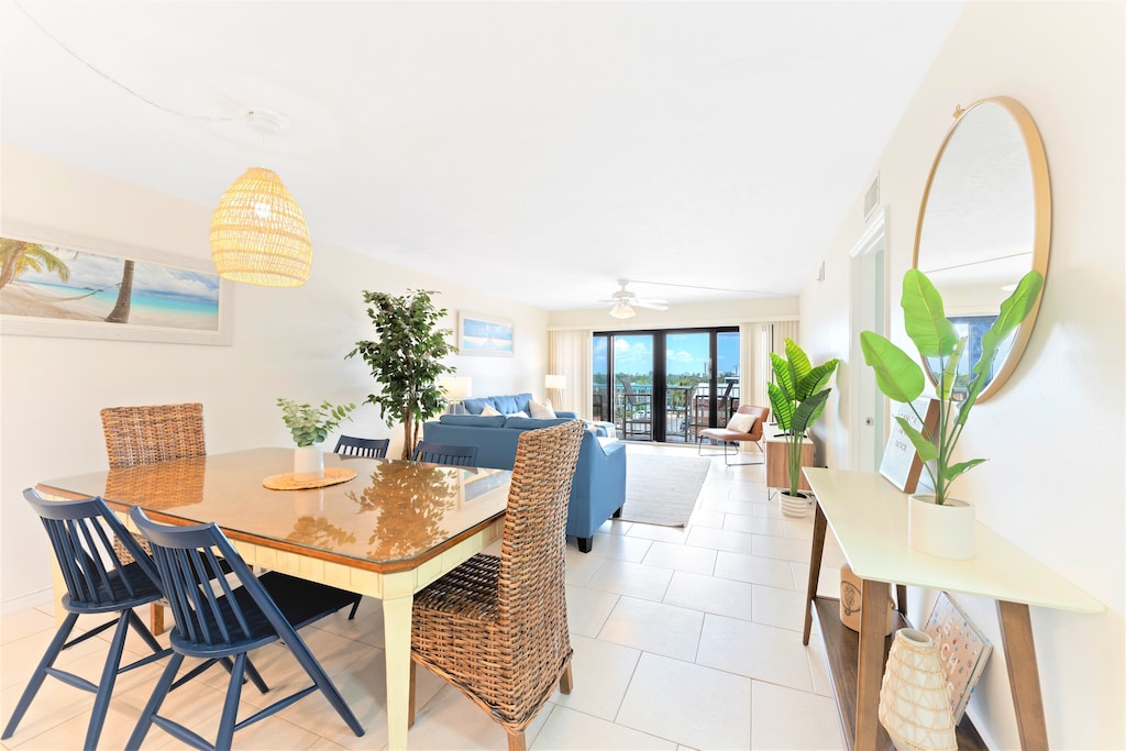 Welcome to Sandcastles 402! This spacious open concept living & dining room walks out onto your private balcony