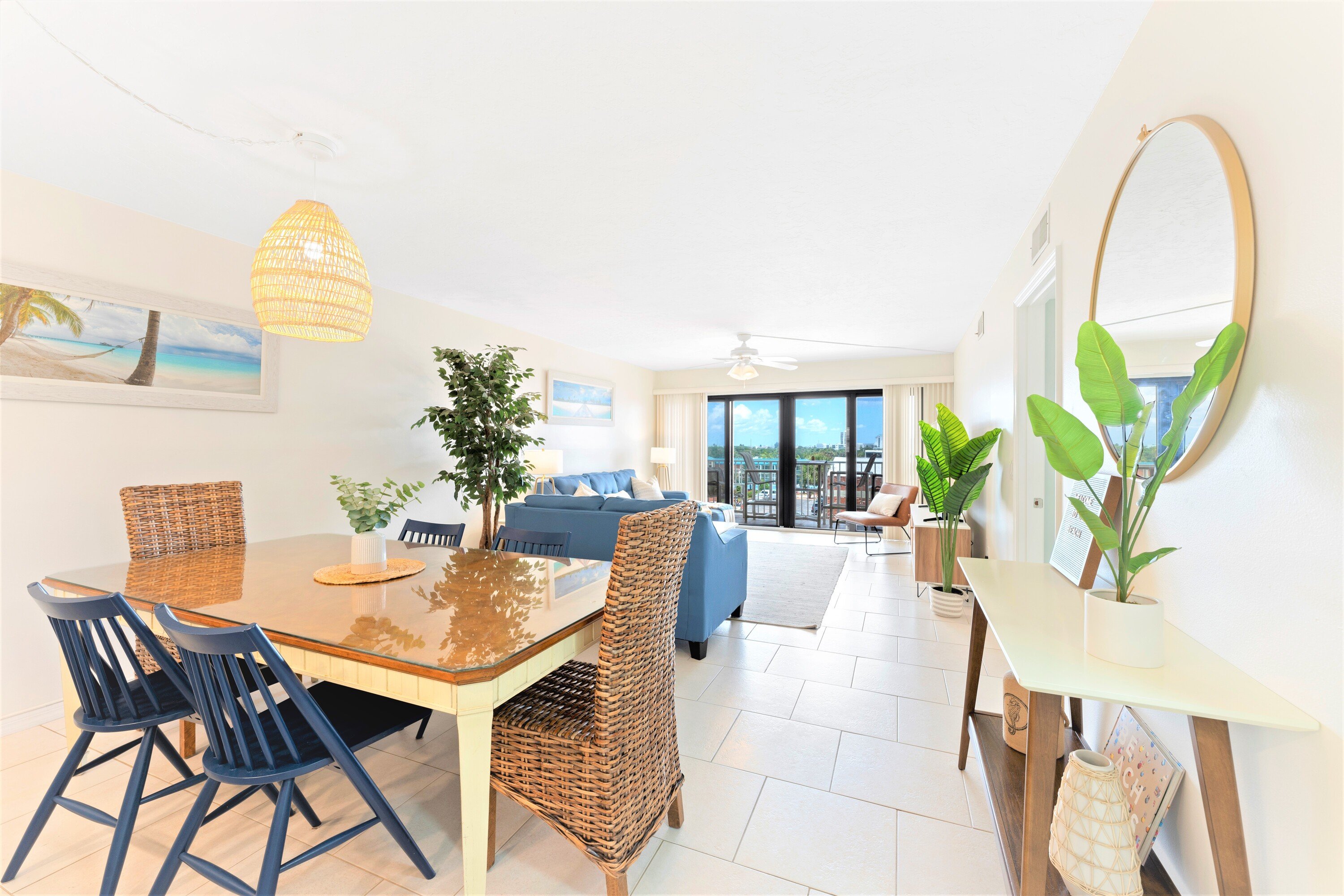Welcome to Sandcastles 402! This spacious open concept living & dining room walks out onto your private balcony
