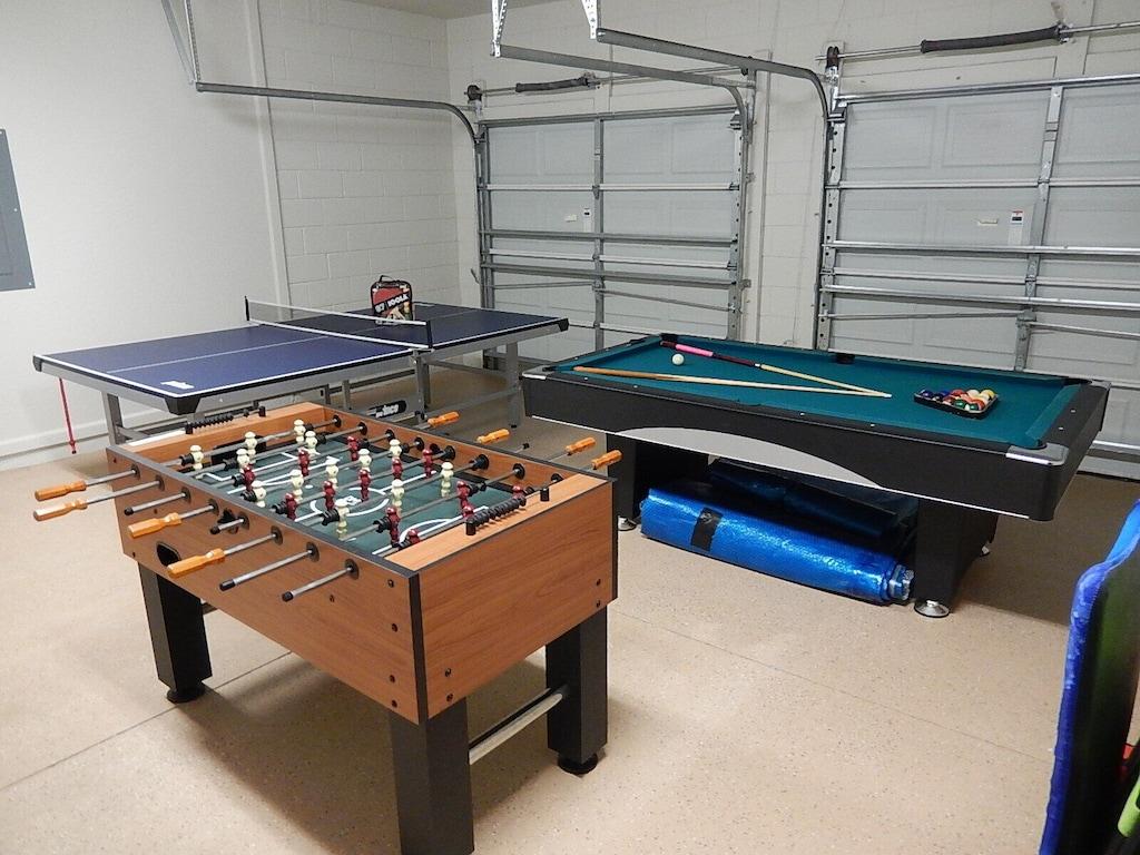 Exciting game room including foosball, ping pong and pool tables