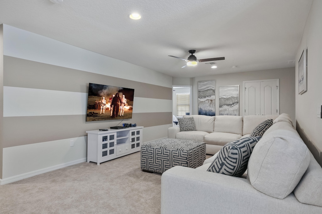 View 2 of the grand movie room adjacent to the play area