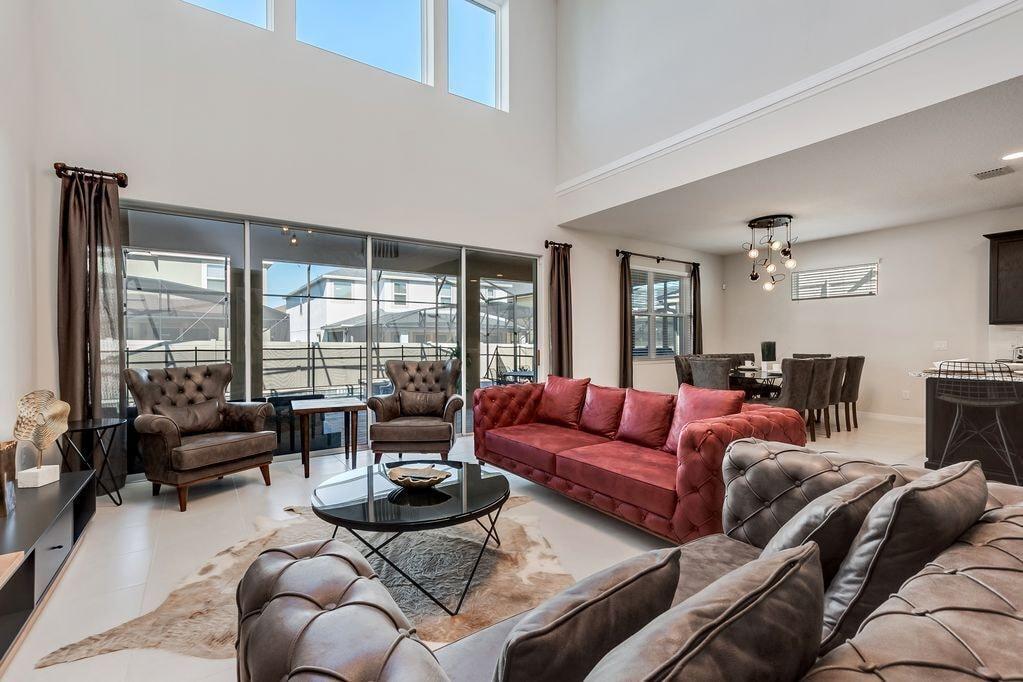 Incredible living room area with expansive seating and flat screen TV