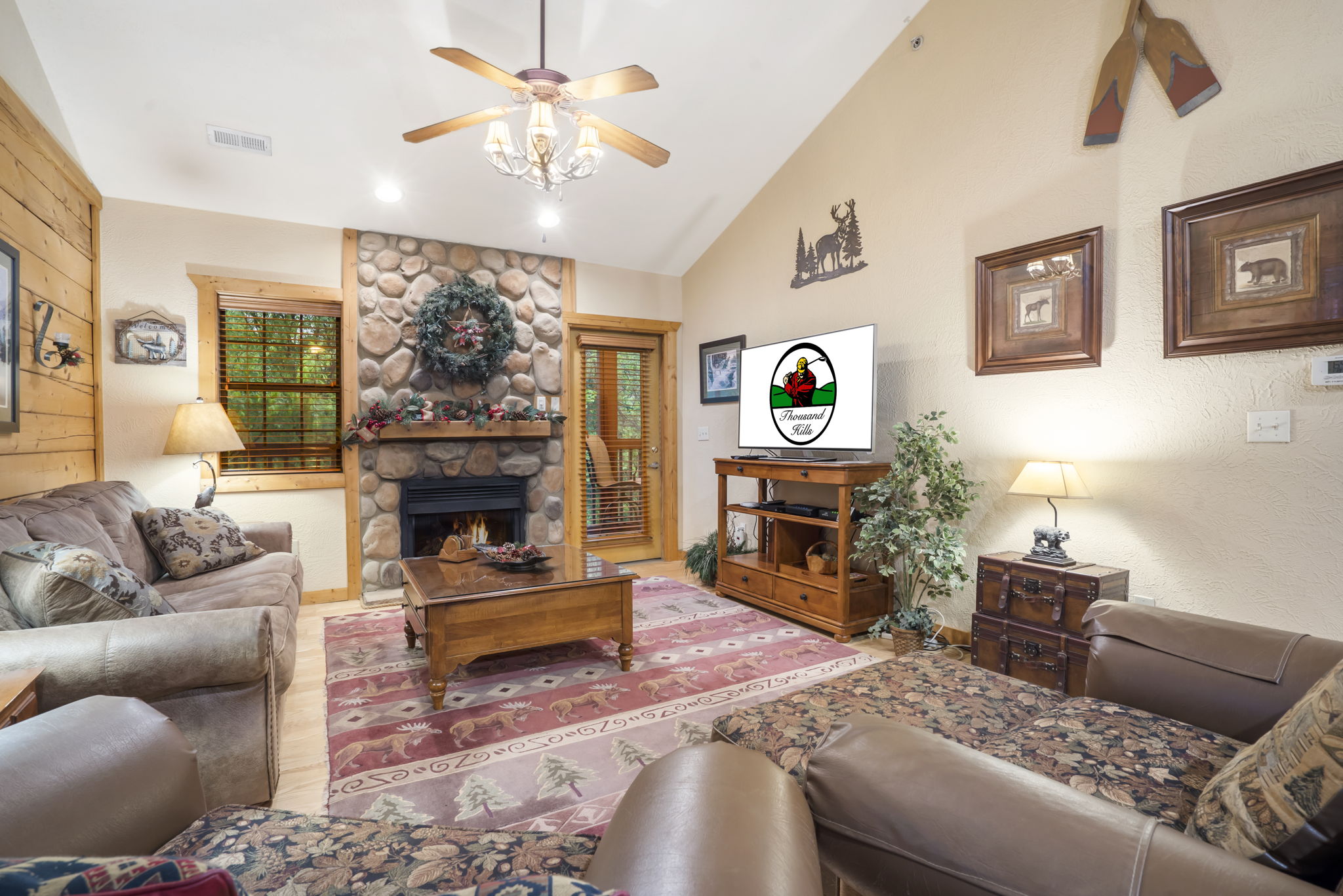 Living Room with Cable TV and Seasonal Fireplace